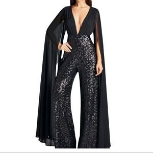“Shining Angel" Sequin & Chiffon Winged Jumpsuit in black. Size 4.